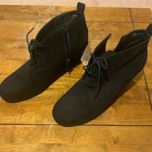Black suede wedge bootie, never worn.